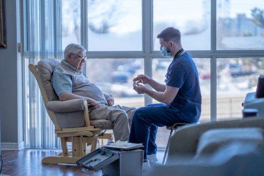 nurse-gives-vaccine-injection-to-senior-man 540x360